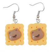 A proper tea biscuit at tea-time never hurt nobody. A round-faced teddy bear never did no harm. Now the two are joining forces to make for an adorable fashion statement.  Tea Time Biscuit Teddy Drop Earrings provide that adorable, funky pop style for the kawaii fashion lovers out there.